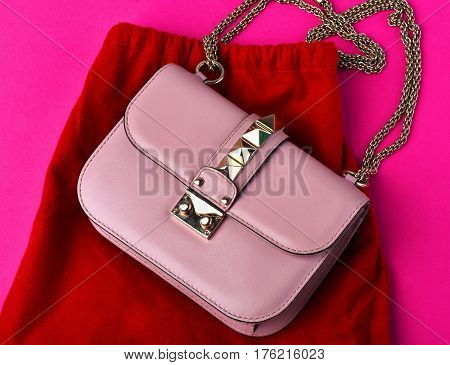 Small Womans Leather Pink Bag With Red Skirt