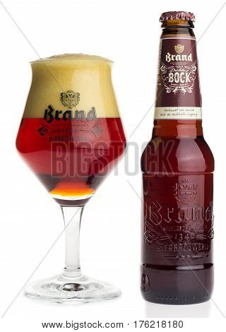 GRONINGEN, NETHERLANDS - MARCH 13, 2017: Bottle and glass of Dutch Brand Dubbel Bock beer isolated on a white background