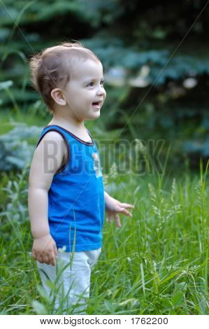 Laughing Boy On Grass