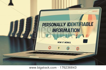 Modern Conference Room with Laptop Showing Landing Page with Text Personally Identifiable Information. Closeup View. Blurred Image with Selective focus. 3D.