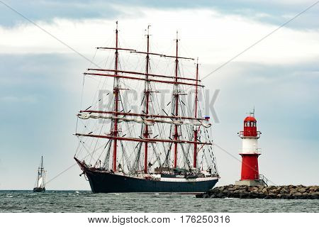 Sailing ship on the sea. Tall Ship.Yachting and Sailing travel. Cruises and holidays. Postcard and Book cover.
