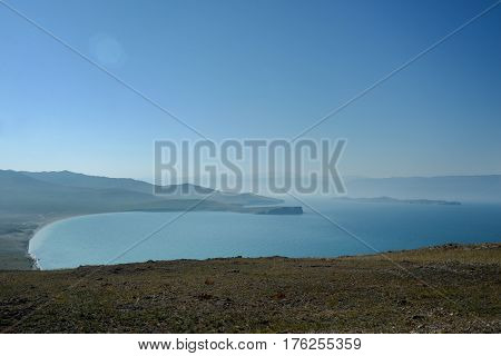 Baikal lake near Khuzhir villahe at Olkhon island in Siberia, Russia. Lake Baikal is the largest freshwater lake in the world.