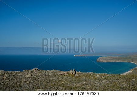 Baikal lake near Khuzhir villahe at Olkhon island in Siberia, Russia. Lake Baikal is the largest freshwater lake in the world.
