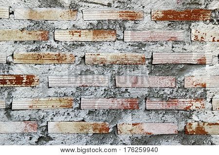White and brown wall from bricks for background.