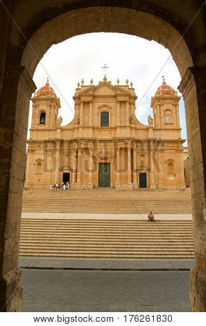 People Walking In Front Of The Cathedral At Noto