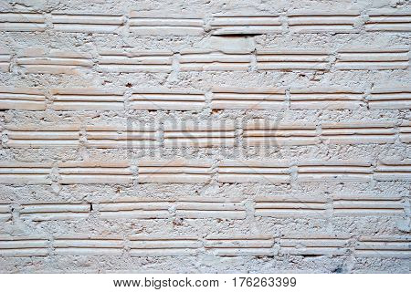 White and pink wall from bricks for background.