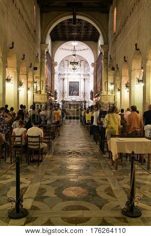 People Praying At The Cathedral Of Siracusa On Sicily