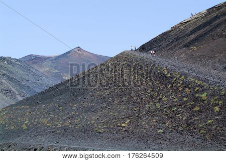 People Hiking At Mount Etna On The Island Of Sicily