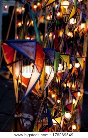 Multi colored star lamps and background .