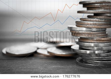 Double exposure coins with growing graph Saving money Economy Investment and Saving Concept.