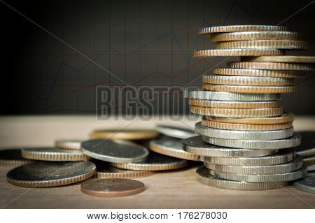 Double exposure coins with growing graph Saving money Economy Investment and Saving Concept.