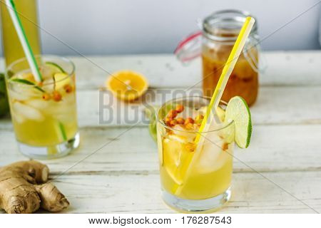 Fresh Ginger Lemonade Over White Wooden Background