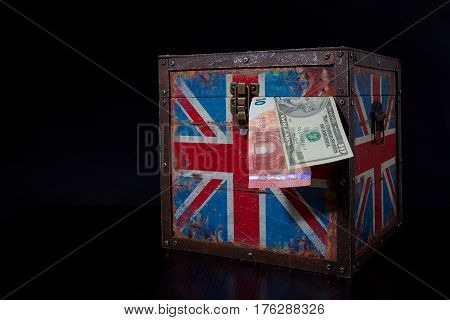 euro banknote and american dollar on British flag