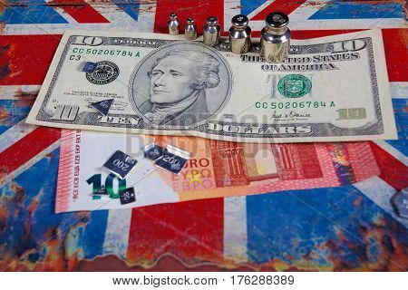 euro banknote and american dollar on British flag