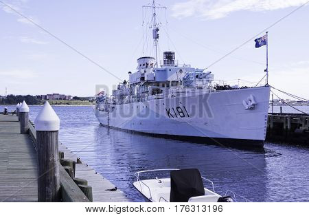 Halifax, Nova Scotia, September 23, 2015 -- Wide view of a small British gunship docked in Halifax Harbor and a bright sunny day in September in Halifax, Nova Scotia.