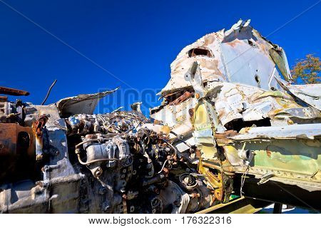Fighter jet airplane wreck view with blue sky background