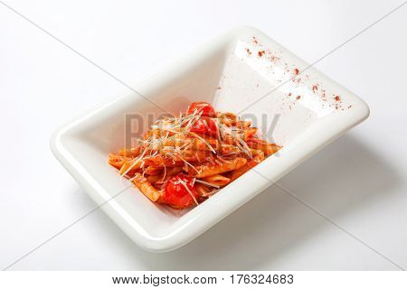 Pasta With Tomato Sauce Sprinkled With Parmesan Cheese
