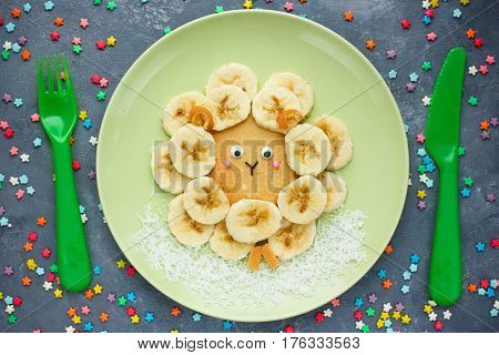 Easter lamb pancakes with banana creative idea for kids Easter breakfast top view