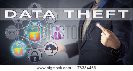 System administrator in blue shirt and suit is identifying a DATA THEFT. Computer crime concept and data security metaphor for unauthorized copying of proprietary data and abusing trusted access.