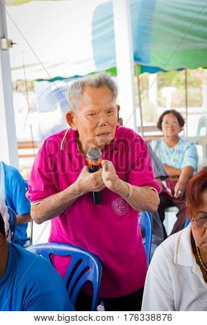 CHIANG RAI THAILAND - FEBRUARY 20 : unidentified man suffering from leprosy with pink shirt speak out at Christian camp on February 20 2016 in Chiang rai Thailand.