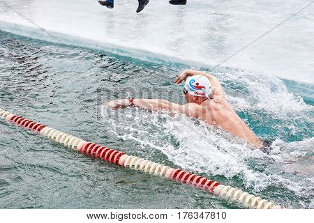 Sahyurta ,irkutsk Region, Russia - March 11.2017: Cup Of Baikal. Winter Swimming. Butterfly