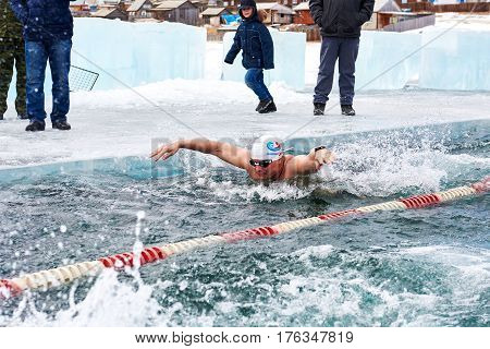 Sahyurta ,irkutsk Region, Russia - March 11.2017: Cup Of Baikal. Winter Swimming. Butterfly