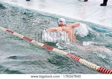 Sahyurta ,irkutsk Region, Russia - March 11.2017: Cup Of Baikal. Winter Swimming. Butterfly