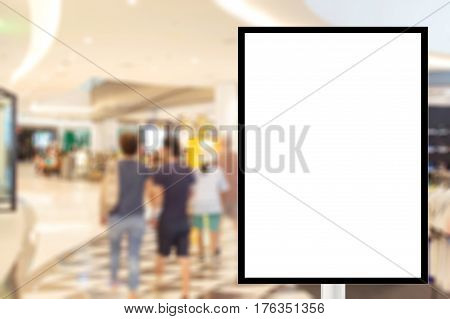 Billboard for store front Advertising poster sign and blurred people in the shopping mall as background for montage display Mock up for display of product.