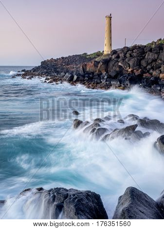 Ninini Point Lighthouse on Nawiliwili Bay in  Kaua'i' Hawai'i overlooking the ocean.