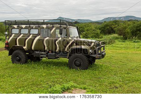 Kamchatka Peninsula, Russia - August 13, 2016: Off-road car on the source of river Ozernaya on Kurile lake. South Kamchatka Nature Park.