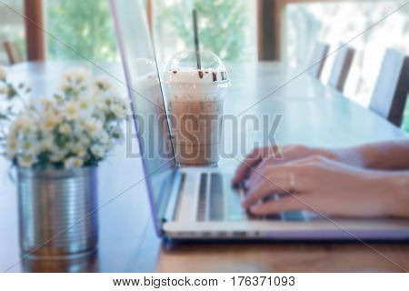 Woman Hands Typing On Laptop stock photo