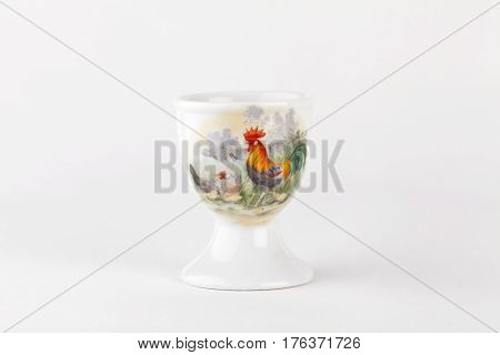UMEA, SWEDEN ON JANUARY 08. Close up on a porcelain eggcup with ornament, artwork on January 08, 2014 in Umea, Sweden. White background. Illustrative Editorial.