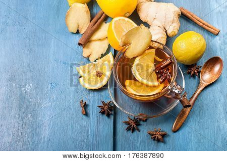 Cup Of Ginger Tea With Lemon And Honey On Dark Blue Background,