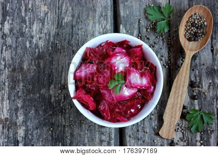 Salted cabbage with a spices top view