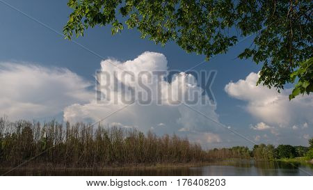 Amazing beautiful spring landscape with a river and clouds. Ukraine. Europe.