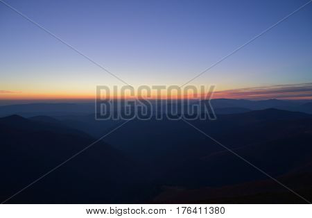 Mountains ridge, blue skyline with sunset. Color Gradient