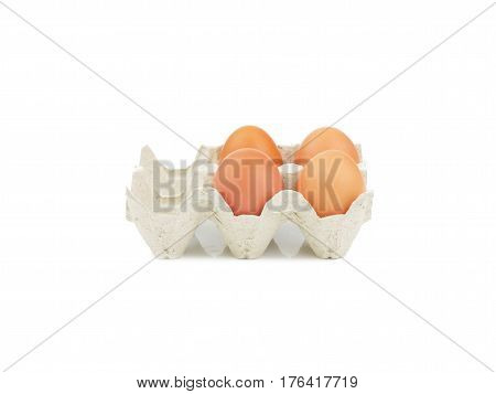 Organic egg in paperboard egg cartons isolated on white