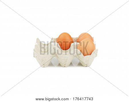 Organic egg in paperboard egg cartons isolated on white
