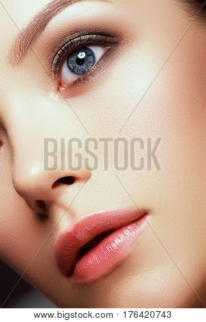 Natural Beauty. Beautiful Face Of Young Caucasian Woman With Daily Makeup