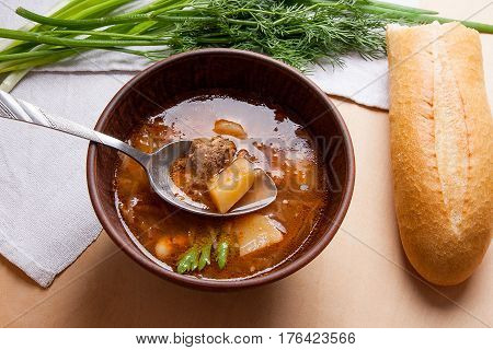 Borsch - Traditional Ukrainian And Russian Red Beetroot Soup With Red Beets In Clay Bowl With Metal