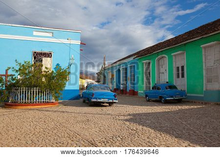 Trinidad Cuba - January 30 2017: Plaza Mayor -Principal square of Trinidad. Typical colonial building with window wooden grate in Trinidad Cuba. One of UNESCOs World Heritage sites since 1988. Sancti Spiritus Province Cuba.