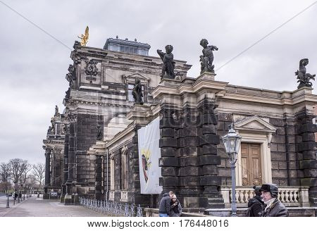 DresdenGermany-January 42017: Dresden Academy of Fine Arts. Nearby tourists walk