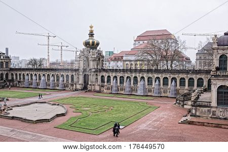 DresdenGermany-January 42017: Zwinger-palace and park complex of four buildings.The beginning was laid in 1709.Tourists visiting the sights