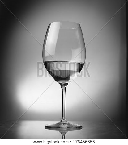 a nice glass of wine waiting for his drink
