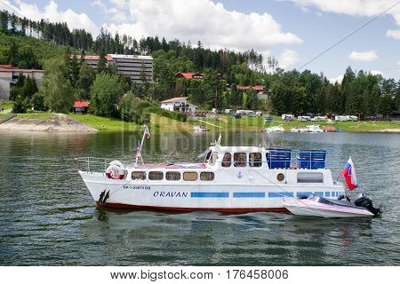 NAMESTOVO SLOVAKIA - JULY 28: Boat on water reservoir Oravska priehrada on July 28. 2016 in Namestovo