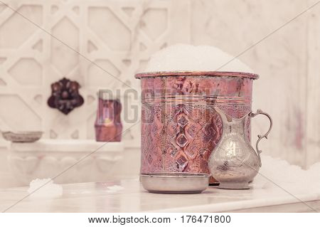 Water Jar And Copper Bowl With Soap Foam In Turkish Hamam. Traditional Interior Details