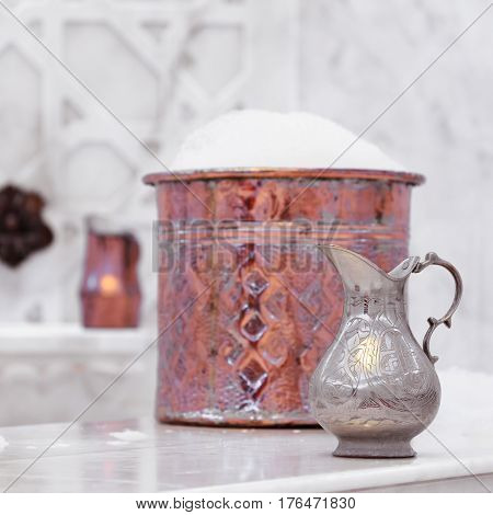 Water Jar And Copper Bowl With Soap Foam In Turkish Hamam. Traditional Interior Details
