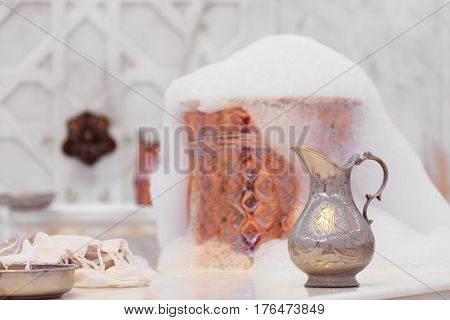 Water Jar, Towel And Copper Bowl With Soap Foam In Turkish Hamam. Traditional Interior Details