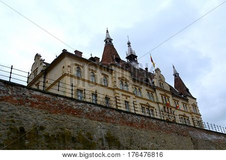 Brukenthal building. Urban landscape in the downtown of the medieval city Sighisoara, Transylvania
