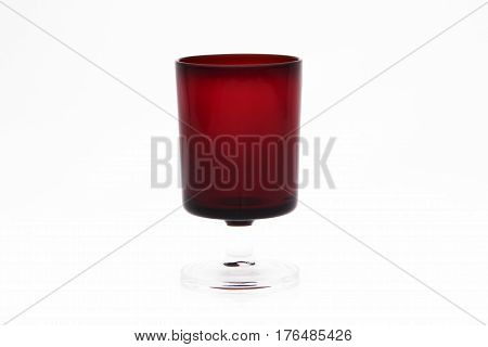 glass with red vine isolated on a white background